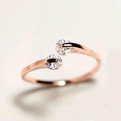 Match Made In Heaven Two Diamonds have come together on a ROSE GOLD on Sterling Silver Ring